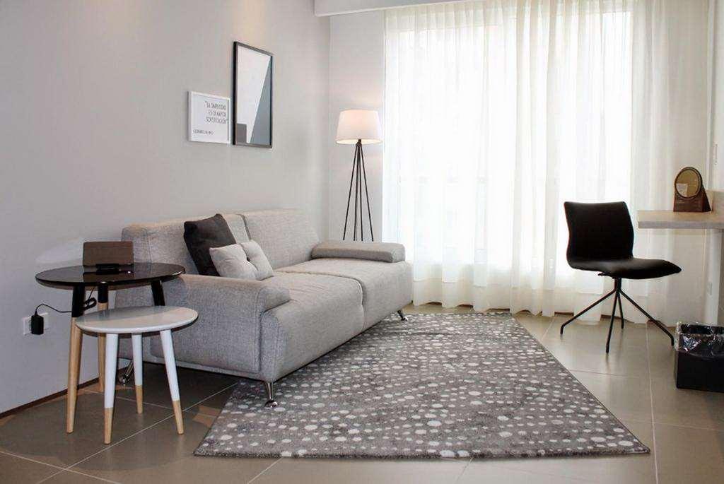 Quo Quality Hotel Manizales Værelse billede A living room with a rug
